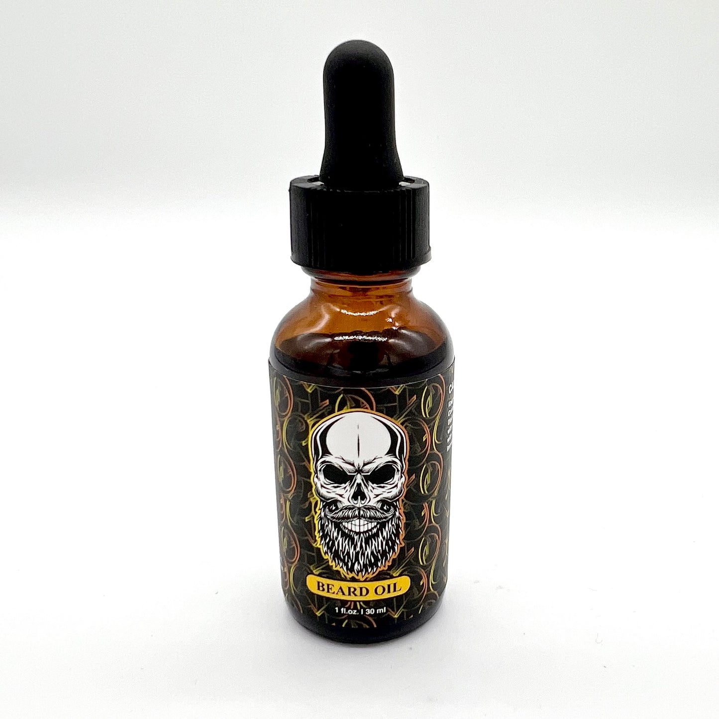 The photo depicts a bottle of El Barber Beard Oil. The bottle is amber with a black dropper cap. The label features a detailed design, including a prominent skull with a full beard. It also states "Beard Oil" and "1 fl oz / 30 ml" in yellow text. The overall design is bold and visually striking, reflecting the brand's edgy style.